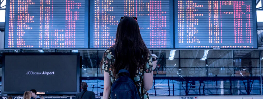 Tips for traveling alone - girl at airport