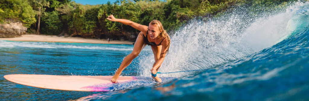 Can You Live in Bali - girl surfing