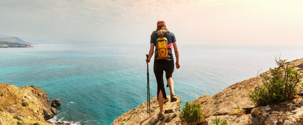 Best hiking trails in bali - hiker overlooking ocean