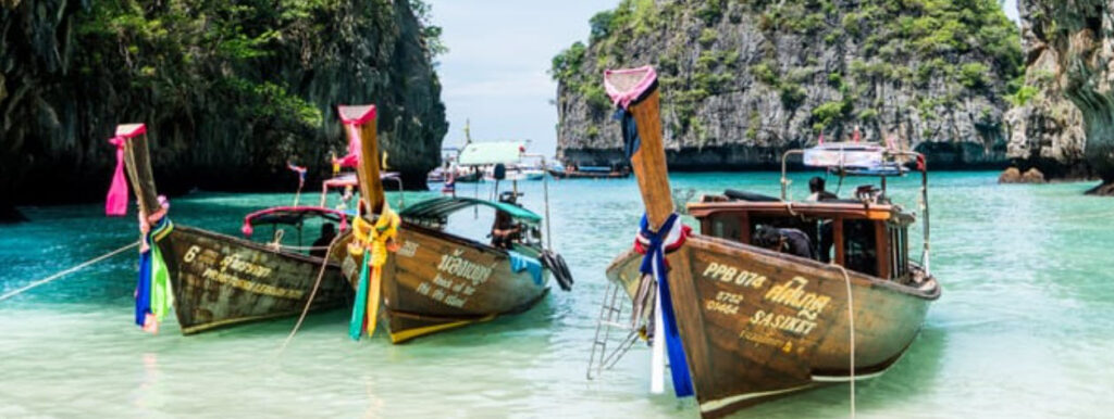 Phuket Travel Guide - boats on beach
