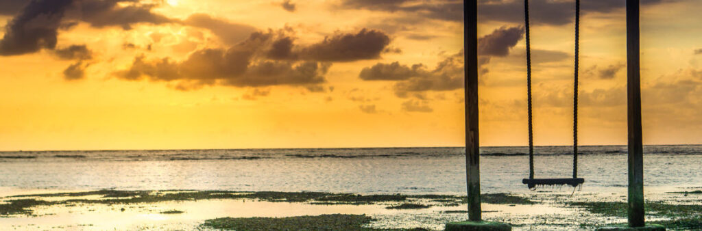 Places to Watch the Sunset in Bali - Balinese swing at sunset