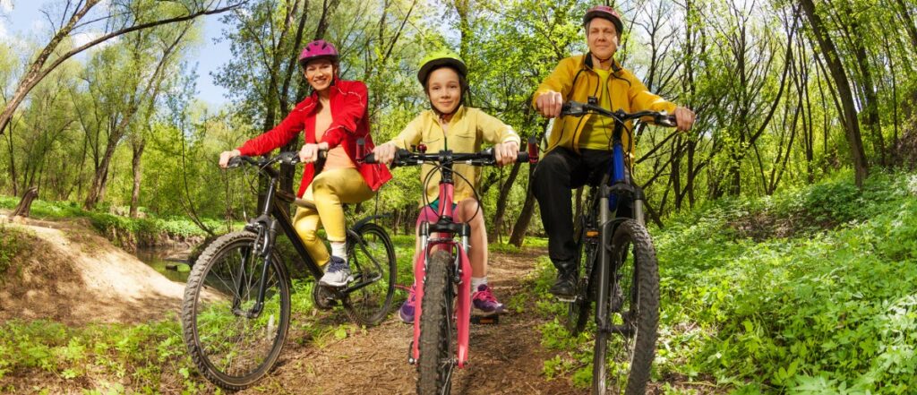 Tips For Flying With A Mountain Bike - family on mountain bikes