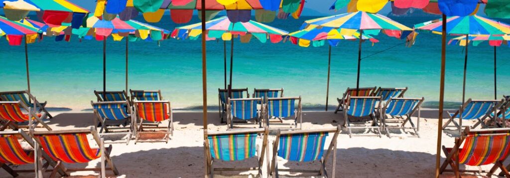 best beach clubs in Phuket - Umbrellas on beach