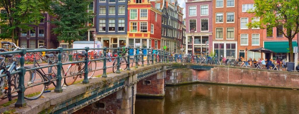 ways to spend one day in Amsterdam - canal and bridge in Amsterdam