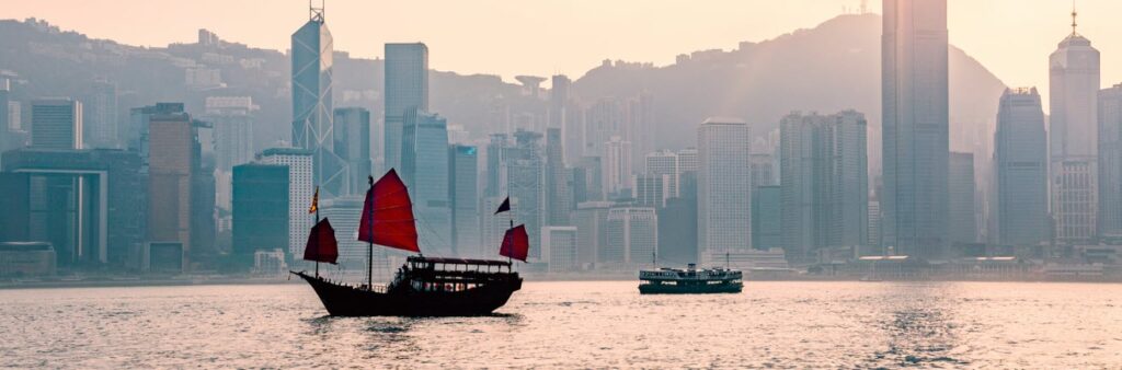 ways to spend one day in hong kong - Boats with hong kong skyline