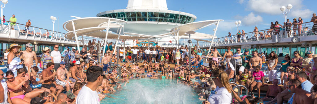 What to Look for When Choosing a Cruise - crowded cruise ship pool