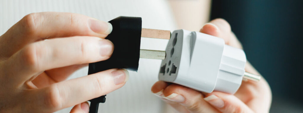 best Power Adapters for International Travel - adapter plugging in