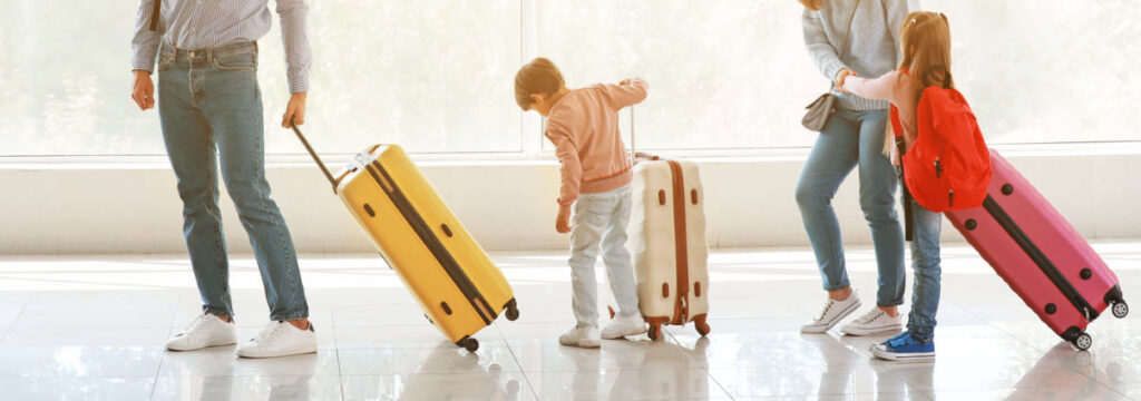 Tips for Booking a Cheap Airfare Online - family with luggage