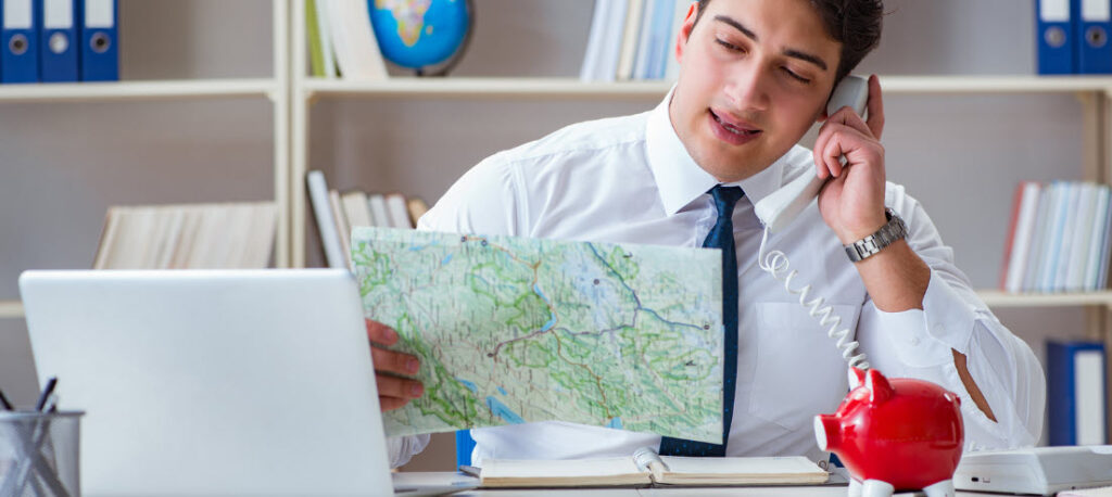 Travel agent vs online booking - man with a map